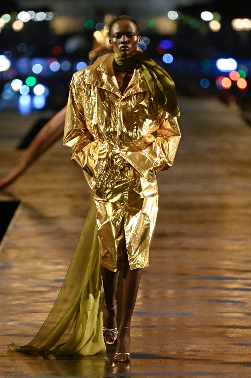 Gold coat and skirt on the Saint Laurent runway