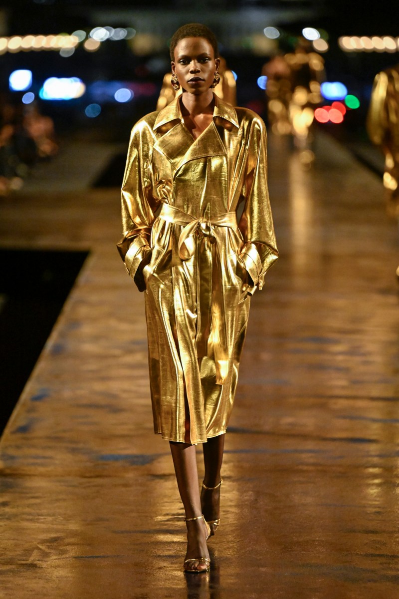 Belted gold coat on the Saint Laurent runway