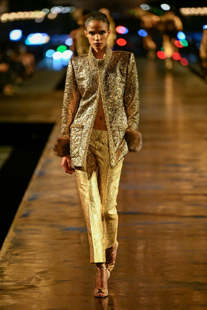 Gold jacket and trousers on the Saint Laurent runway